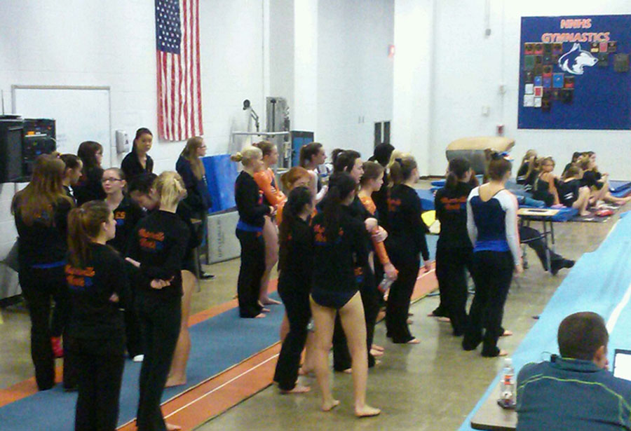 Girls gymnastics team competes in first meet of the season