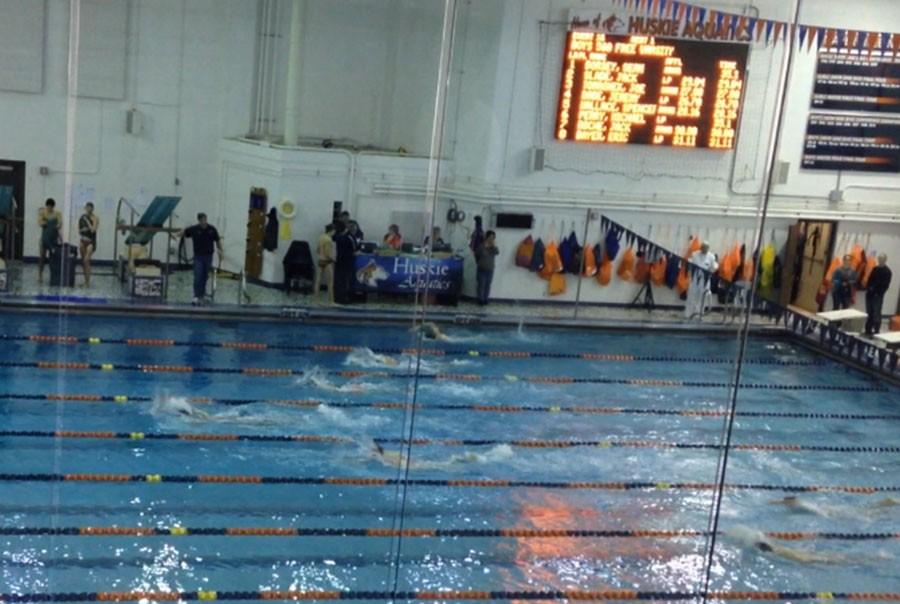 Boys swim and dive team loses crosstown classic