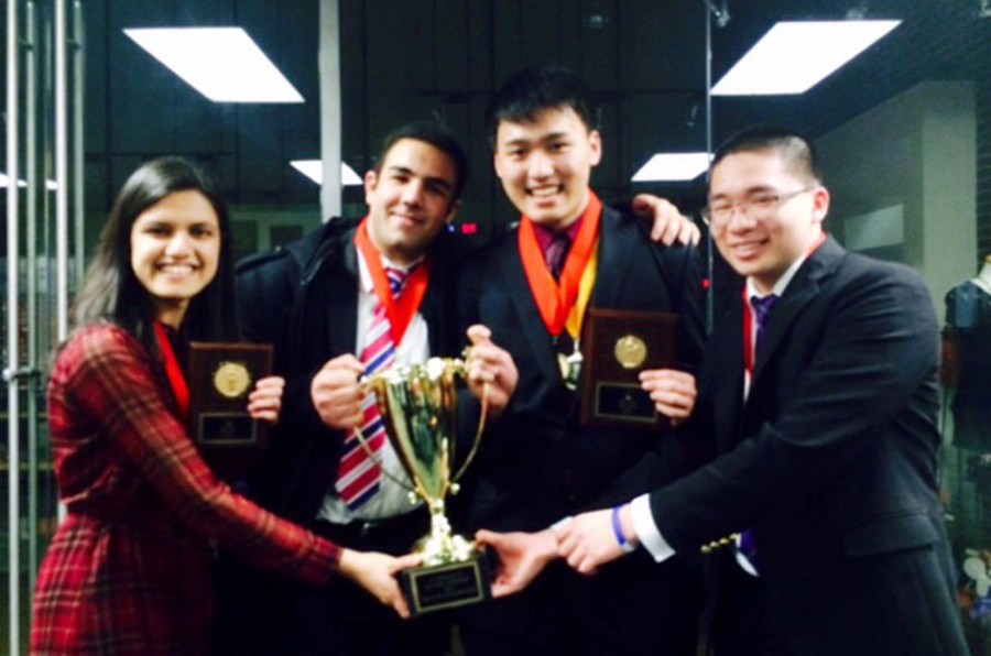 From Left: Baxi, Mostofi, Zhou and Gao pose with their state trophy.