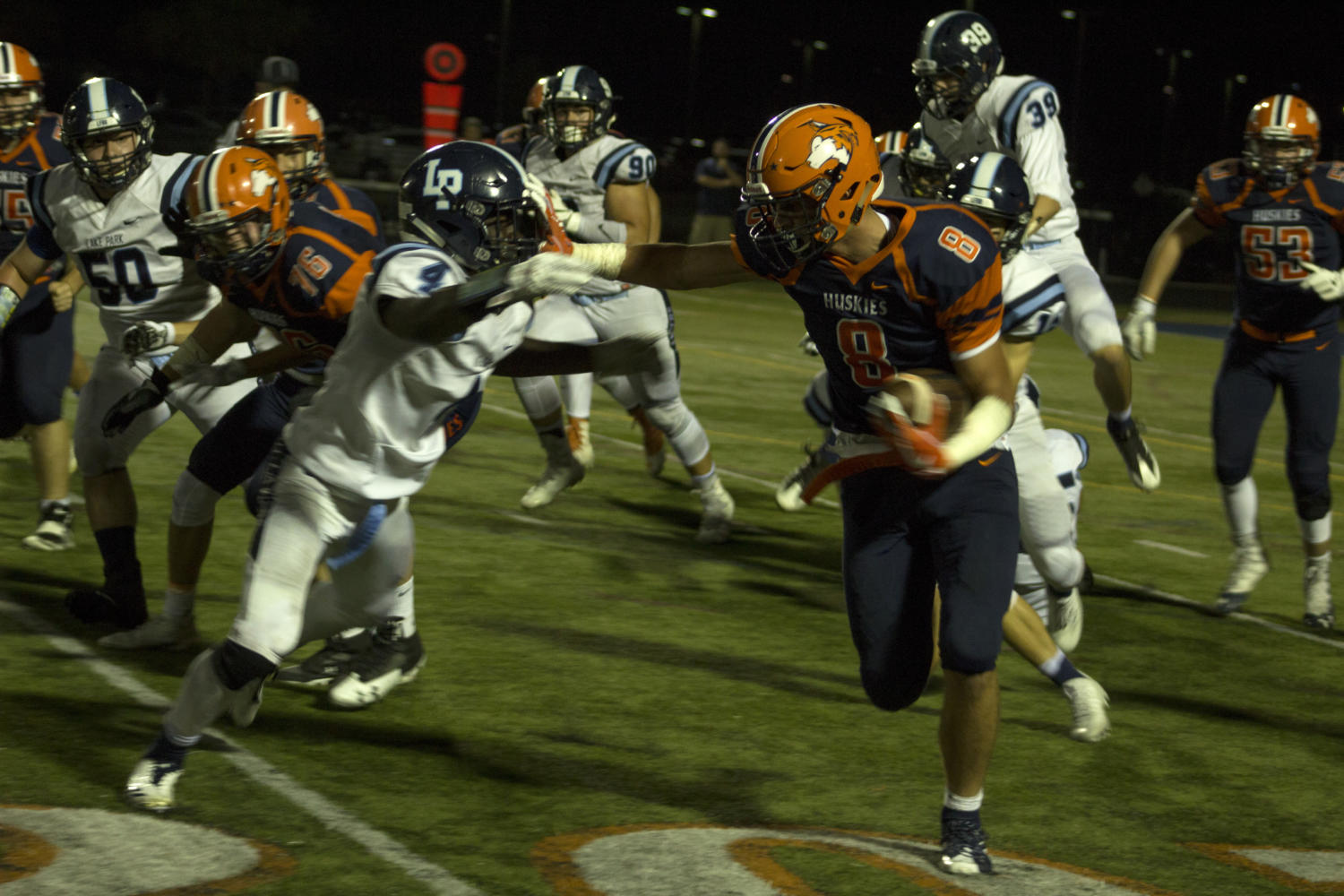 Huskie football improves to 4-0 with come-from-behind victory on Homecoming Night