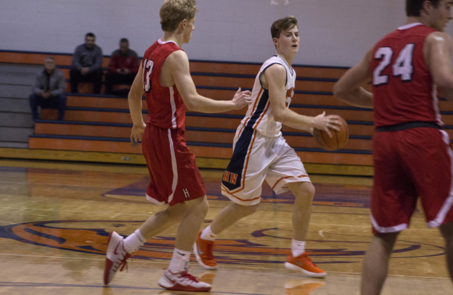 Huskie+basketball+begins+season+with+victory+over+Hinsdale+Central