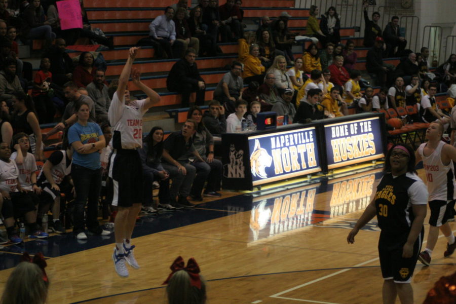 Gus Rue, 20, goes up for a three-pointer in the second half of the game against the Eagles.