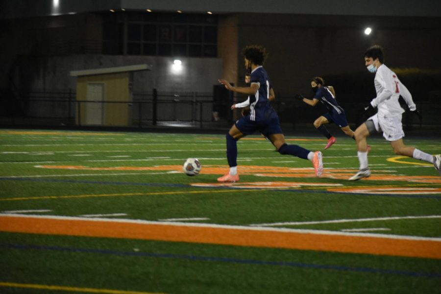 Huskie boys soccer nets a late goal in win over rival Redhawks