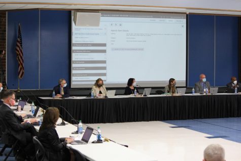 The District 203 Board of Education discusses the new schedule at the Oct. 18 board meeting.