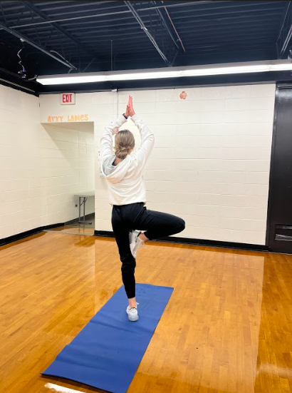 Naperville North student participates in Yoga Club, one of the schools newest activities