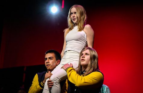 Sophomore Meaghan Inglis is lifted by Freshman Victor Jimenez and Senior Easton Ours during the Spring Musical “Mean Girls.” Inglis played Regina George and is first introduced during the song “Meet the Plastics.” 