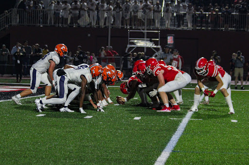 Huskie Football Falls to Naperville Central in Crosstown Classic