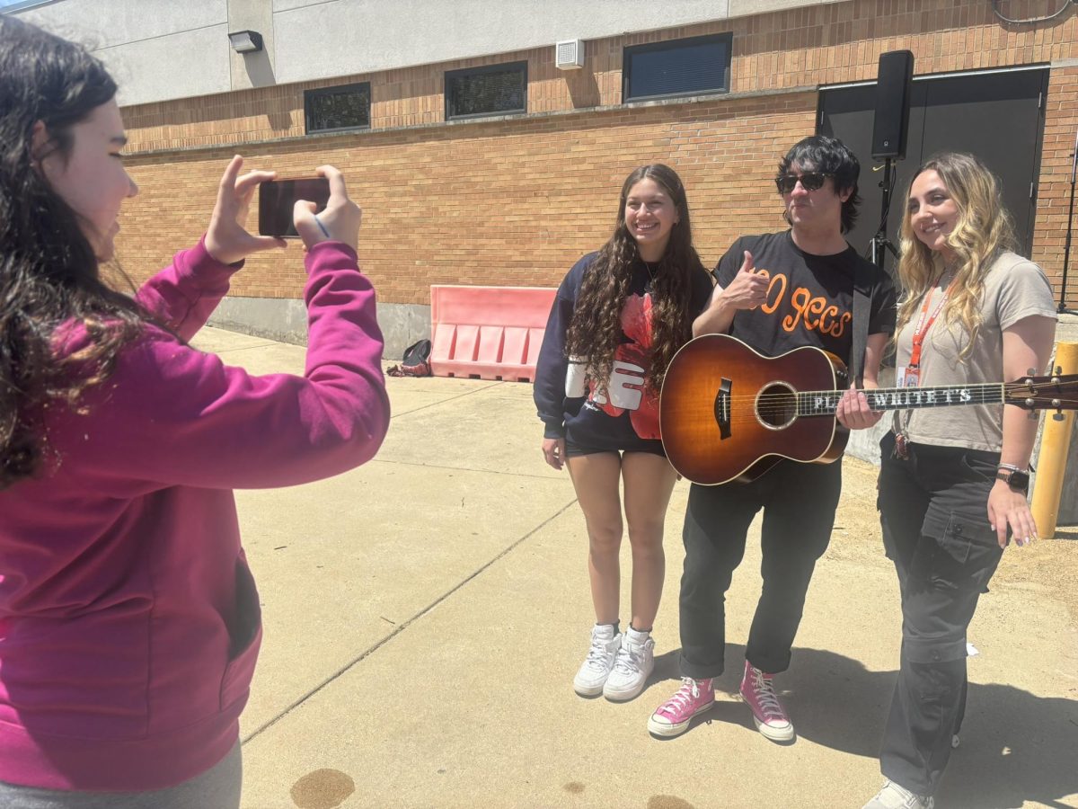 Students enjoy an unexpected performance from The Plain White T’s lead singer and free Dunkin’ Donuts