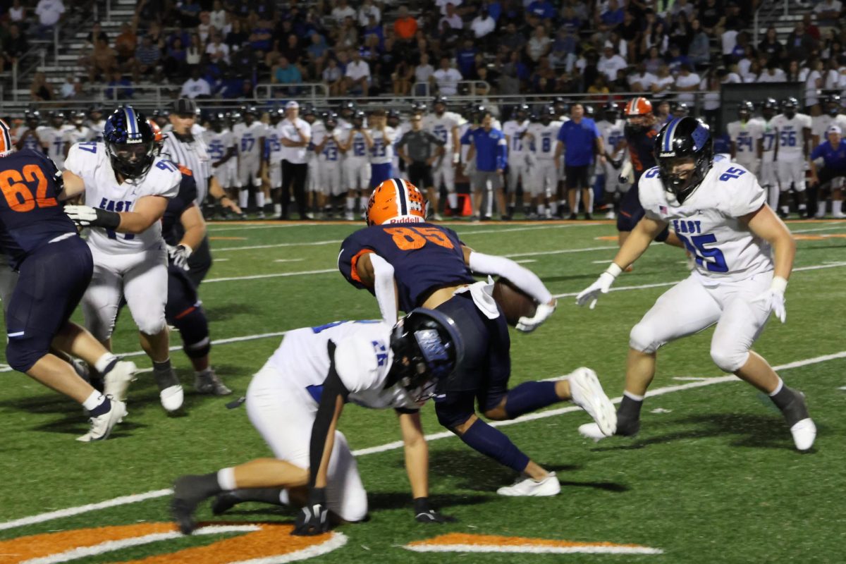 Naperville North varsity football falls to Lincoln-Way East in hard-fought game