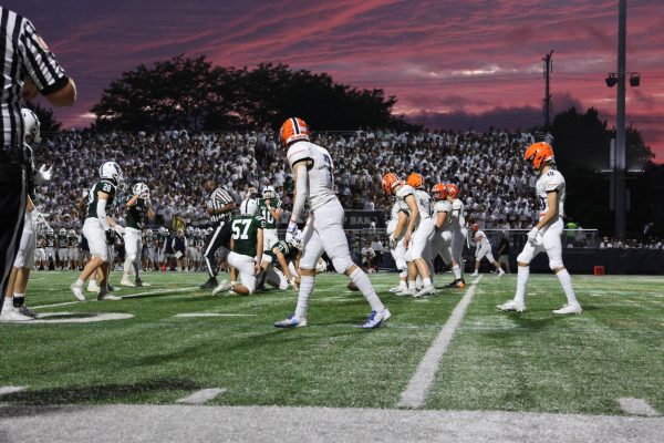 Wide receivers Ian MacConnachie (7) and Charlie Shinkle (10) line up against the Trevian defense.