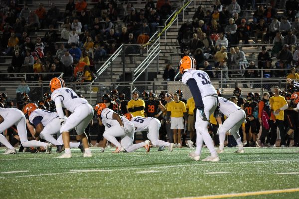 Senior defensive back Edward Mumford (33) analyzes the field on a crucial play.