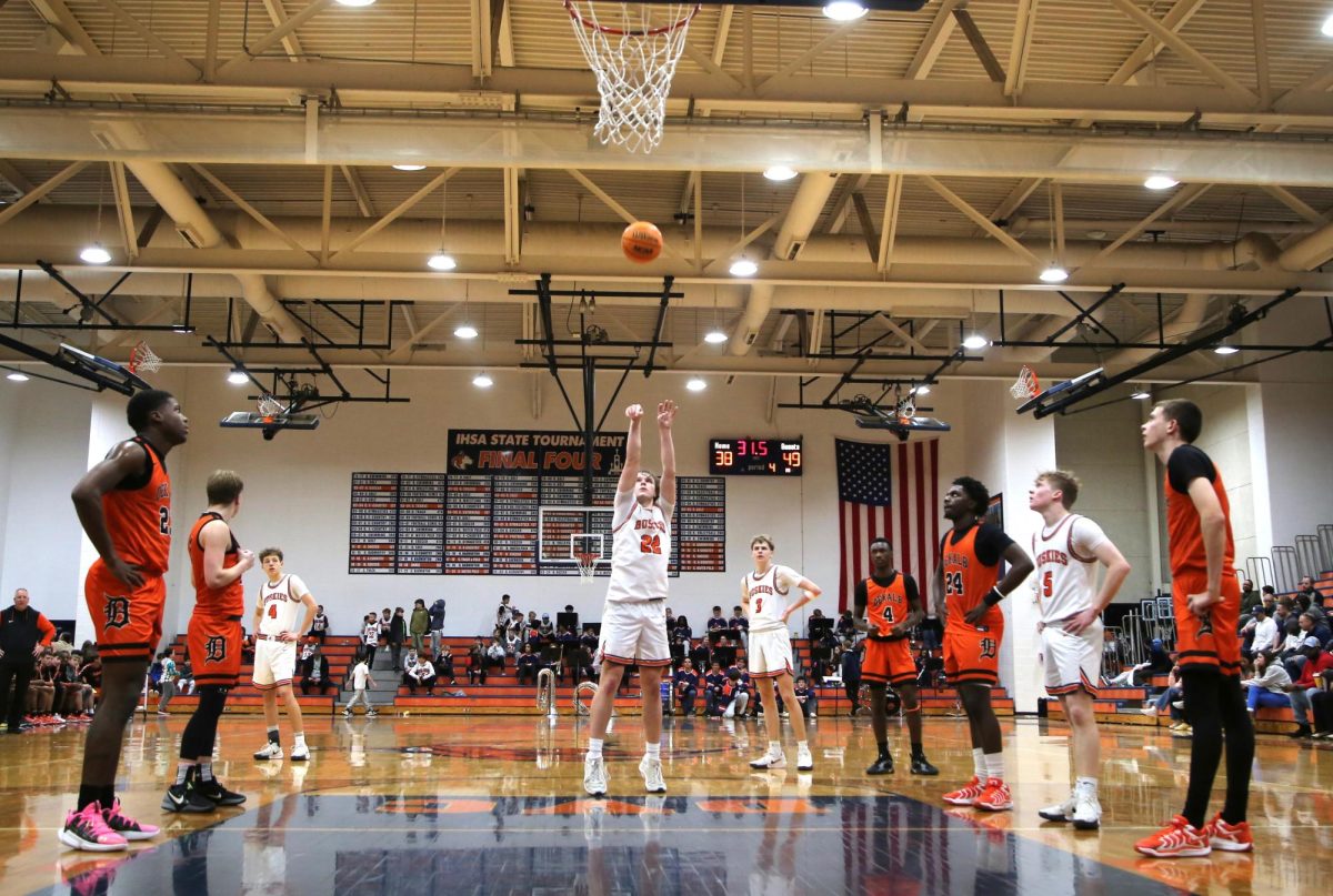 Junior Will Harvey shoots a free throw in a home game against DeKalb.