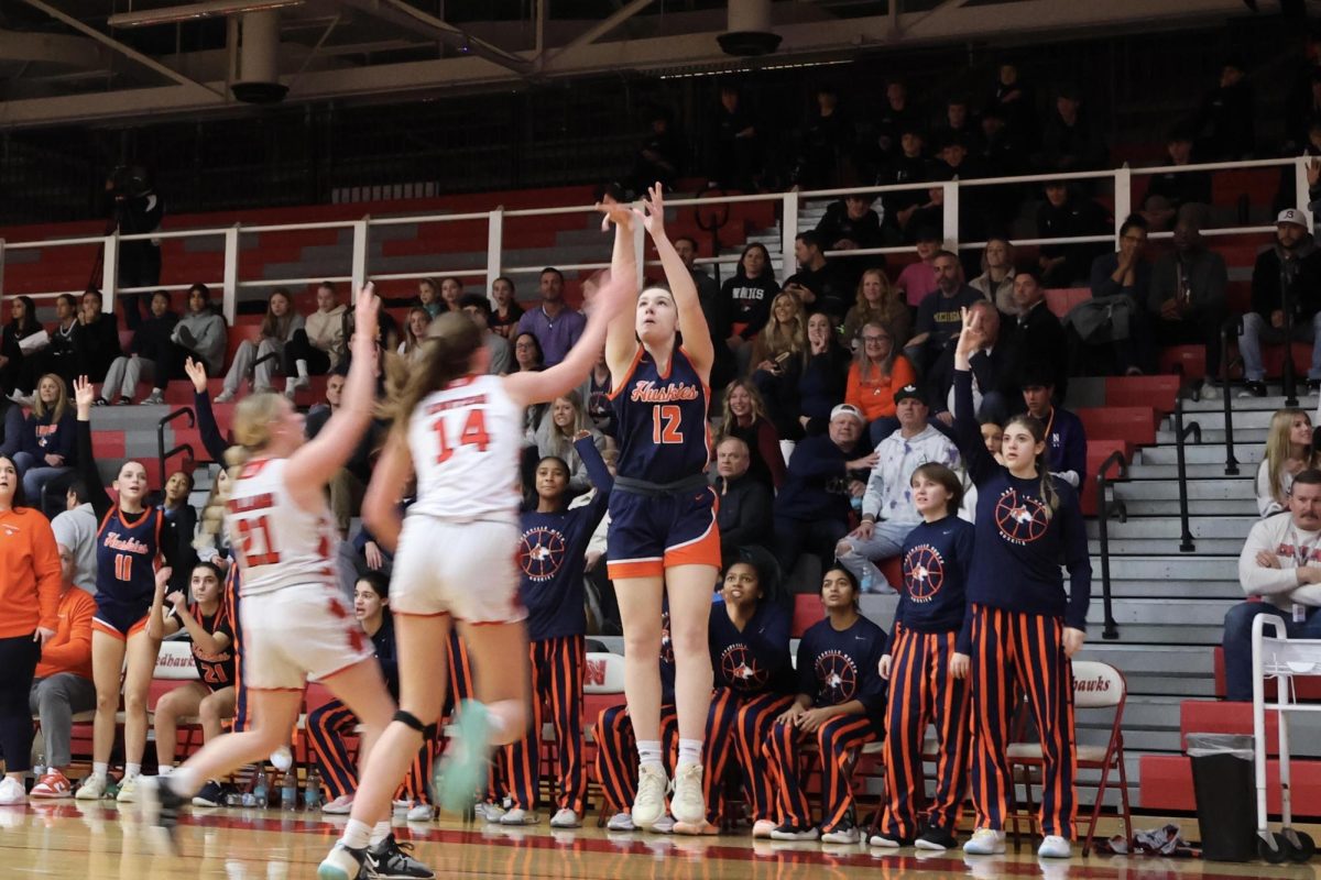 Anna Richards watches her 3-point shot she took seconds before.