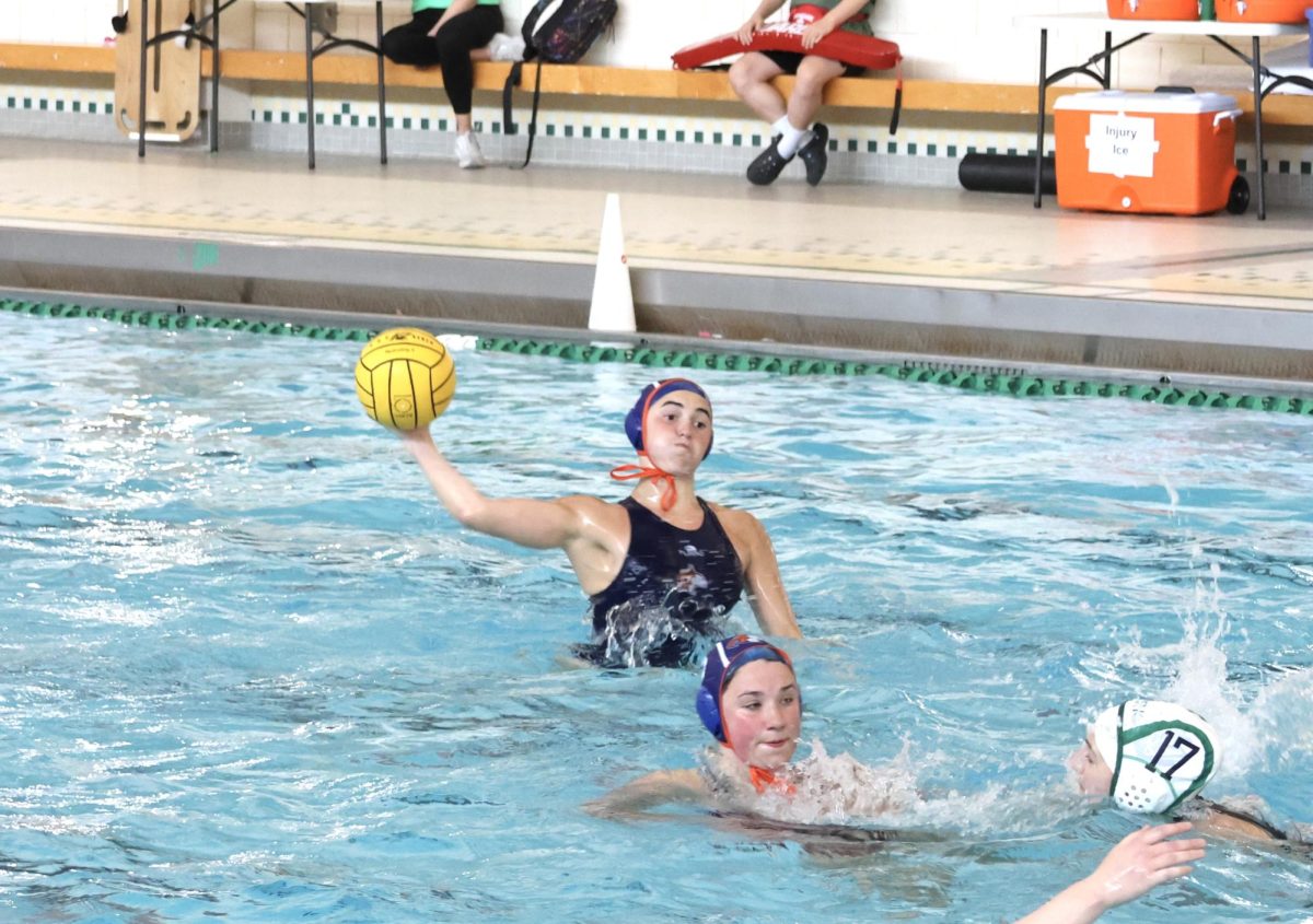 Ava Podkasik (21) rears back to take a shot.