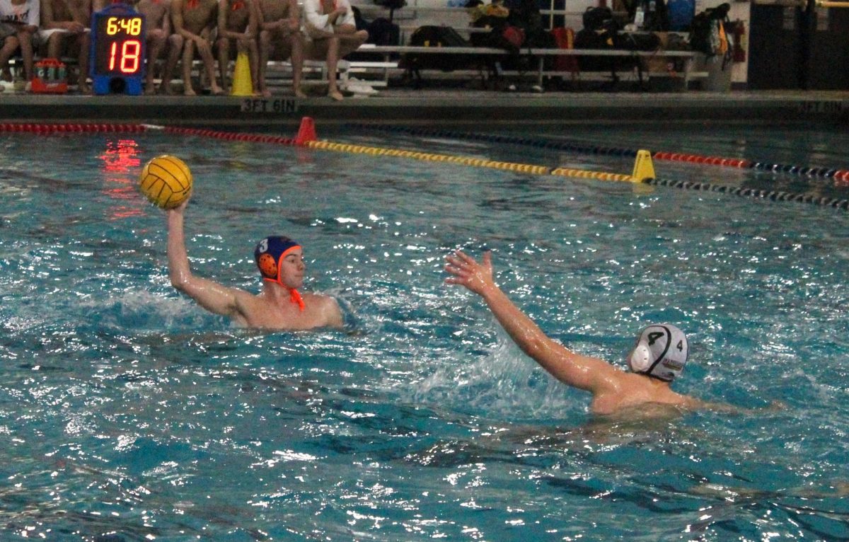 John Riordan  (3) looks around for a pass.