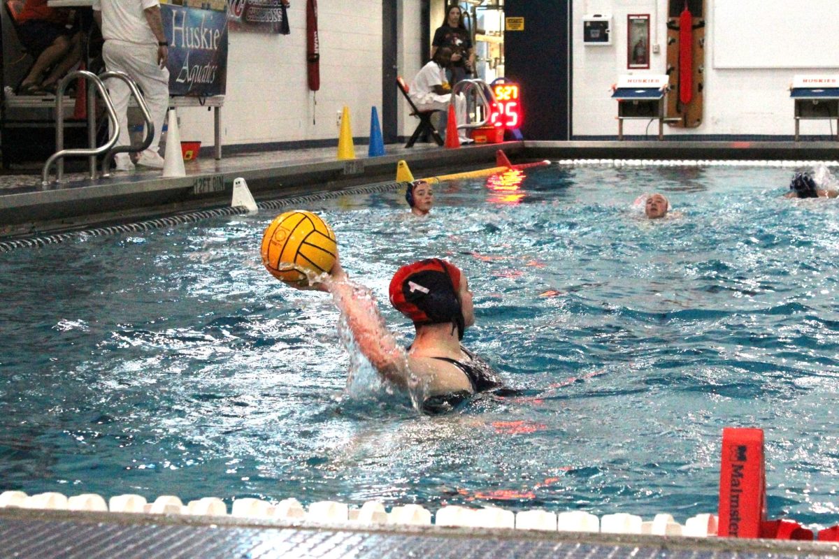 Rugie Stackevicius (1) looks up the pool for a target.