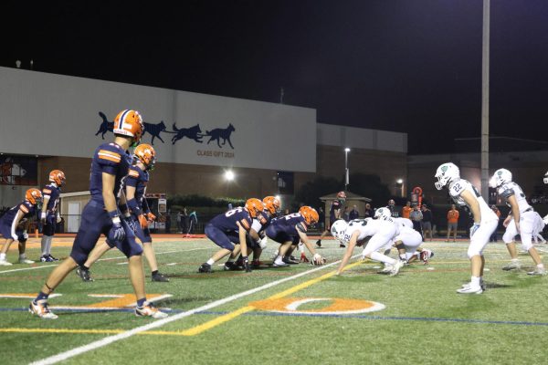 Huskie offense preps for the next down at the ten yard line.