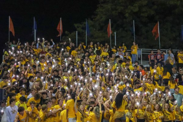The Dawg Pound celebrates the "gold out" theme to support Cal's Angels.