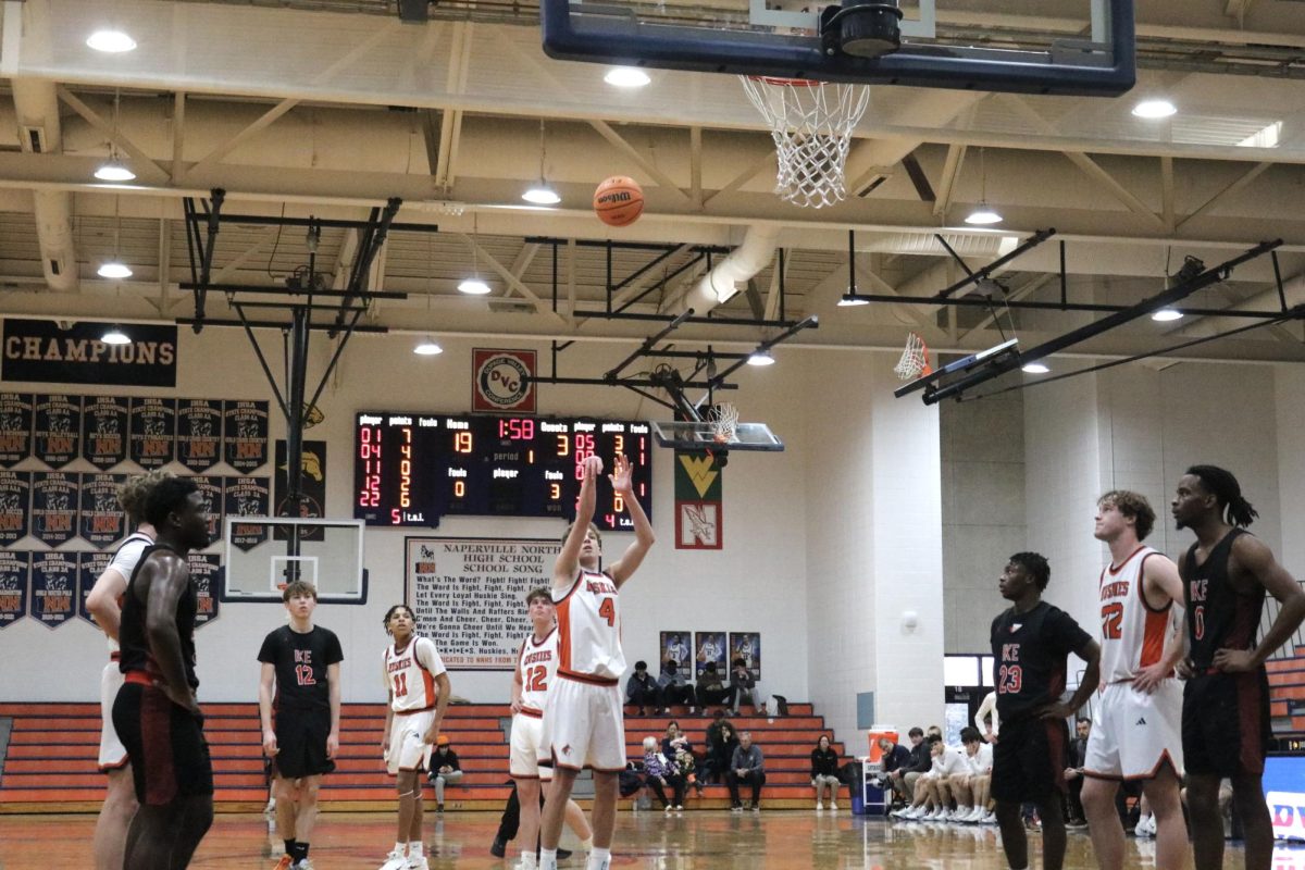Senior Shooting Guard Miles Okyne (4) attempts a free-throw.