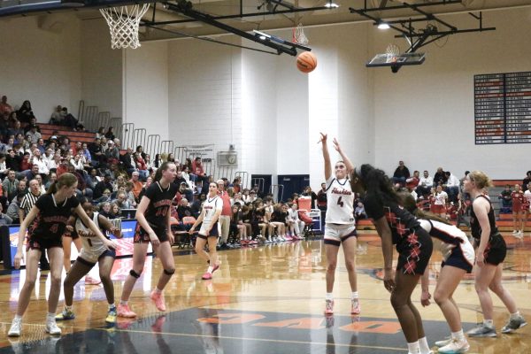 Junior Guard Ava Podkasik (4) attempts a free-throw.
