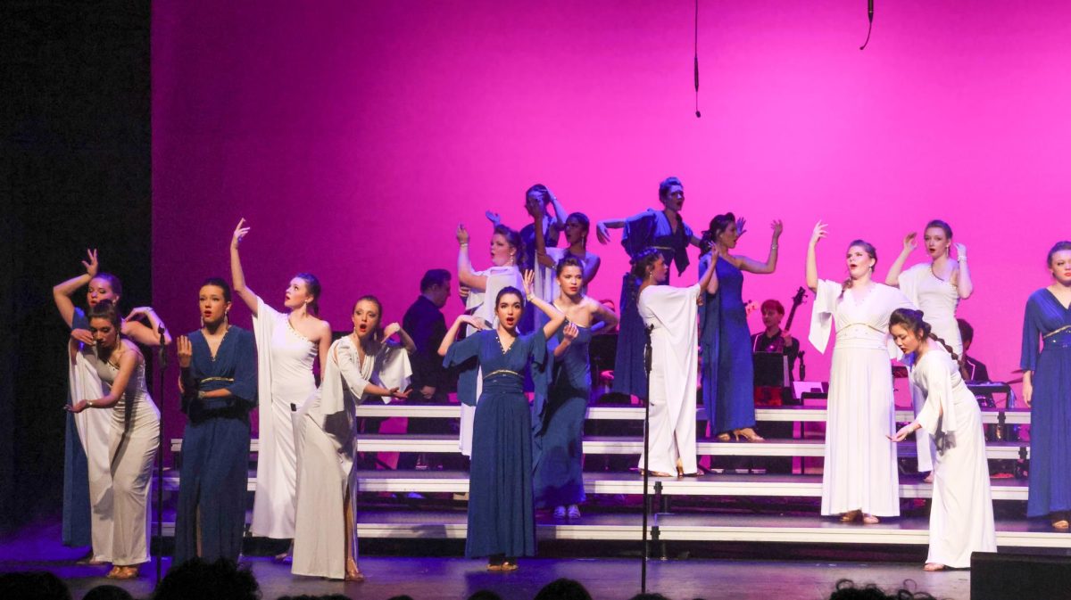 Vivant performers pose like Greek Goddesses as they sing "Goddess," their opening mashup.