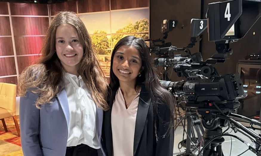 Abby May and Raya Adjmere being interviewed by NCTV17. Photo courtesy of Reshma Ajmere.